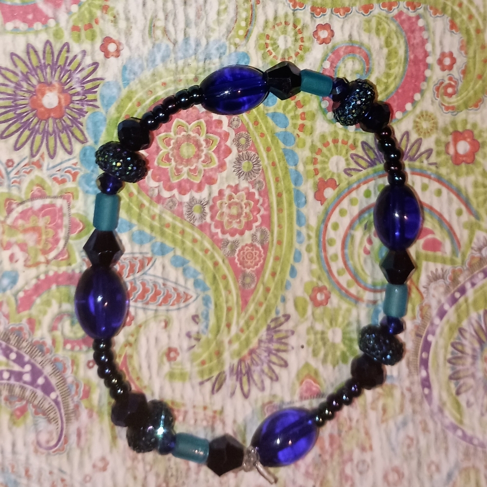SOLD.  Hand Crafted Elegant Blue Beaded Stretch Bracelet